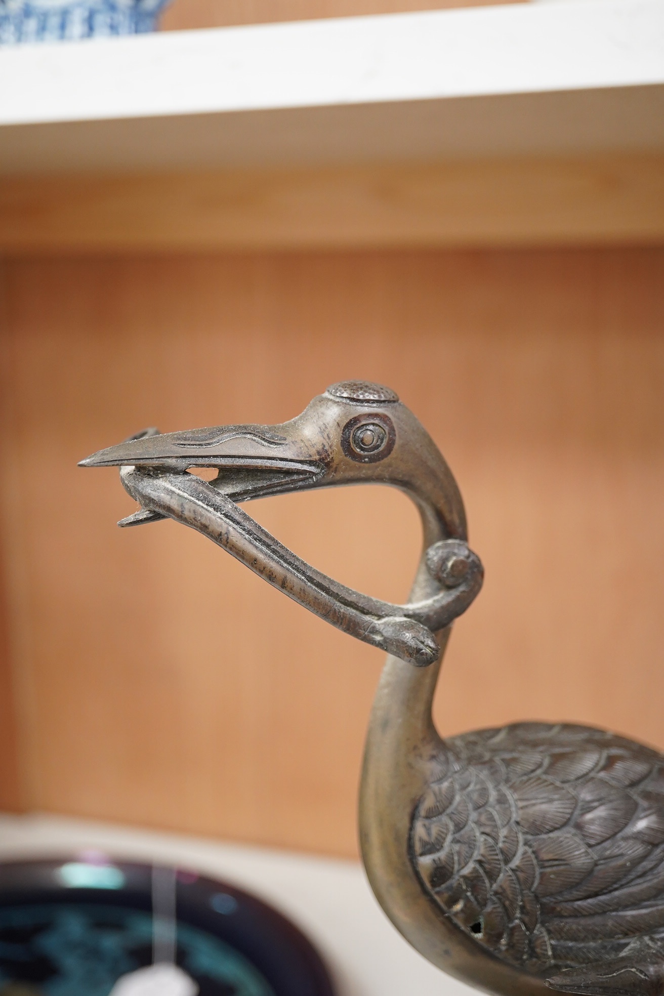 A Japanese bronze group of cranes, 19th century, 39cm high. Condition - section missing from prey in mouth